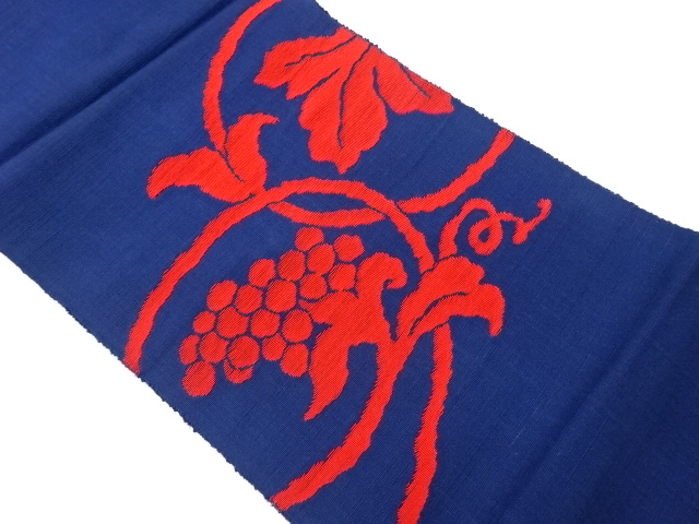 手織り紬実唐草模様織出し名古屋帯